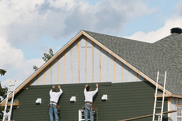 Professional Emergency Siding Repair technician working in Richmond, OH